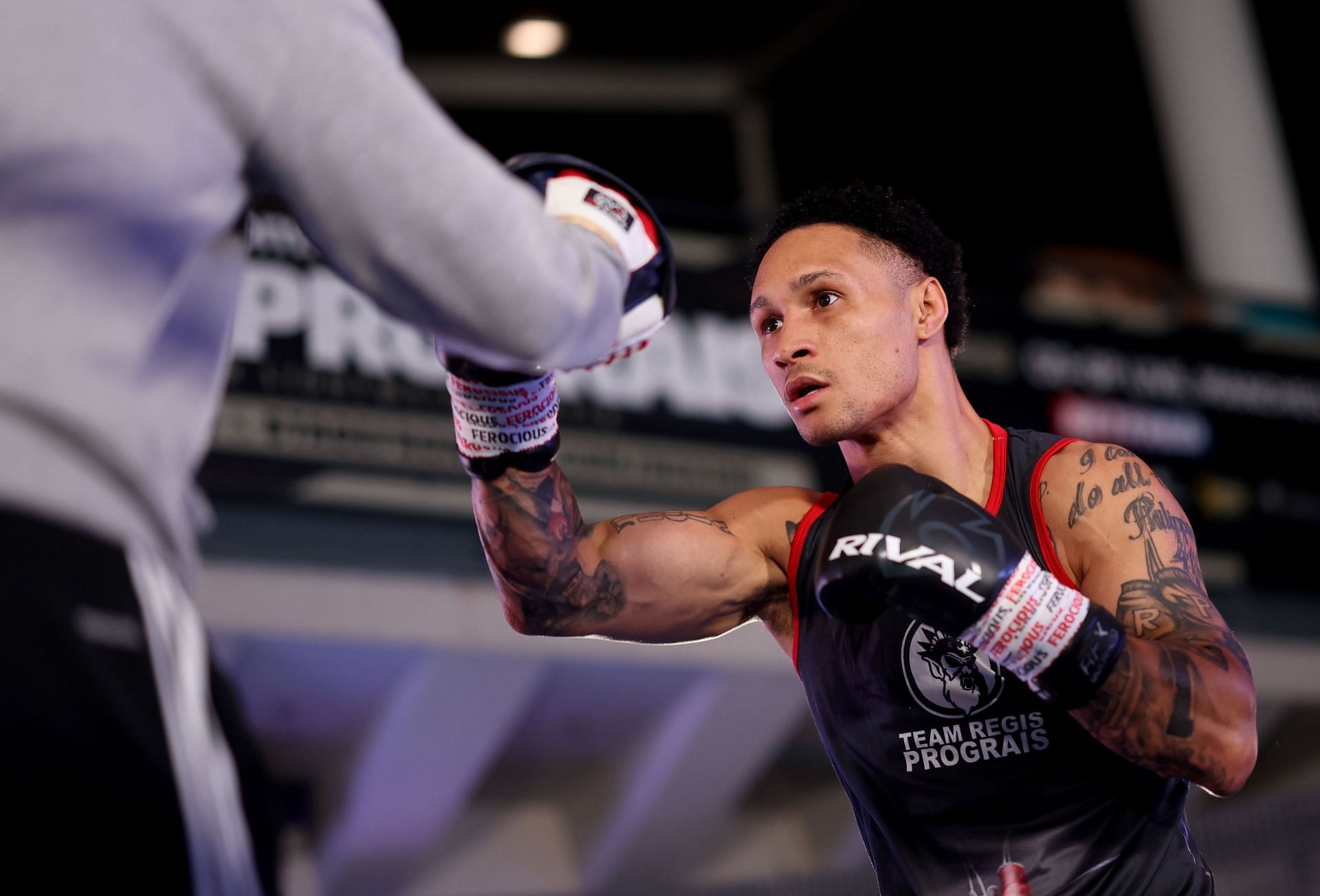 Who is Regis Prograis' trainer?